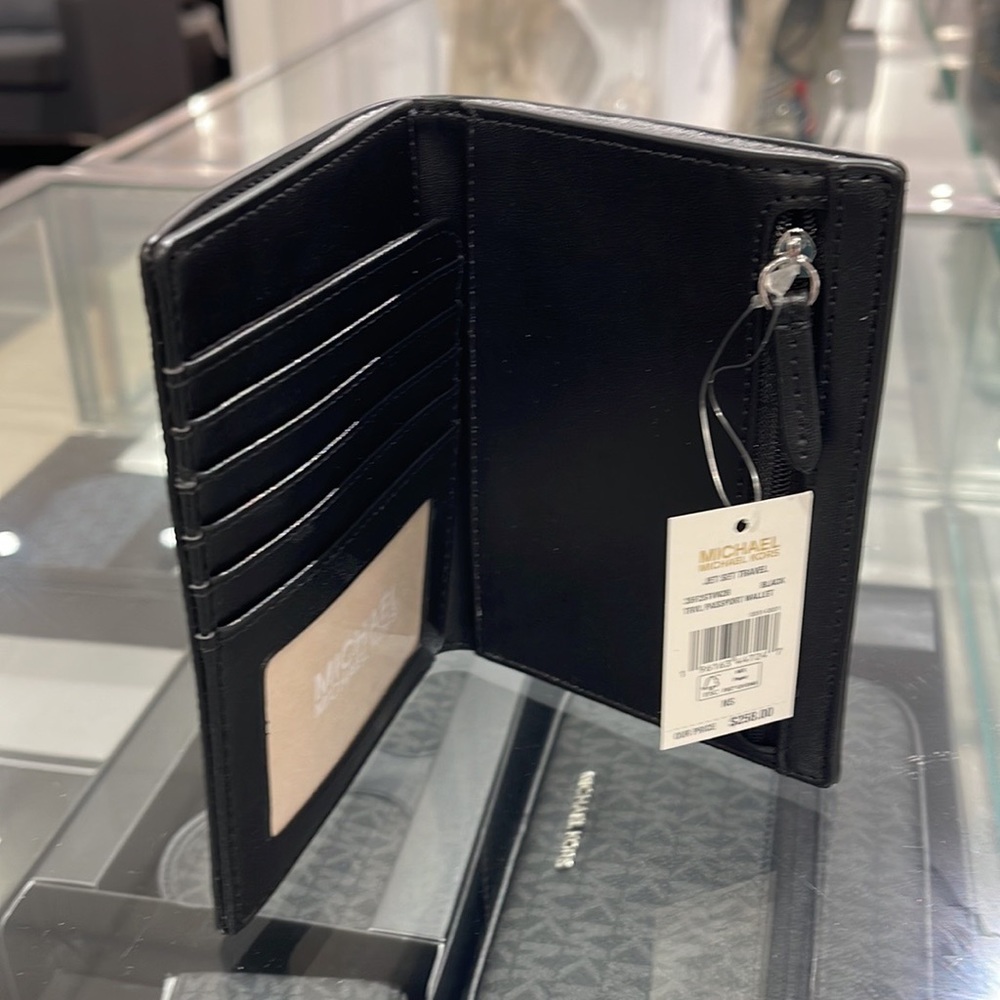 Michael Kors Jet Set Travel Passport Wallet
Black Signature/Silver-Tone Hardware - Picture 13 of 16